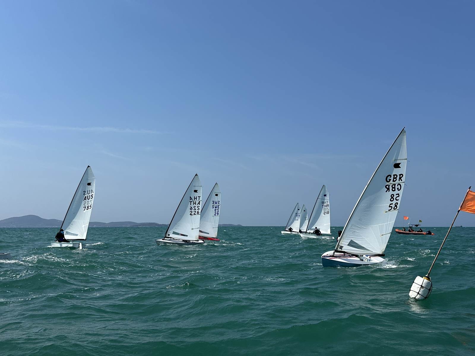OK Dinghy fleet racing off Pattaya
