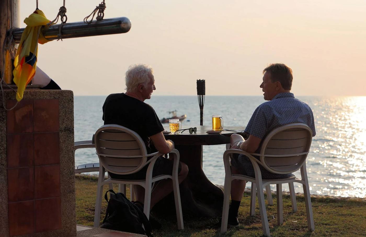 Sailors enjoying sunset drinks at Royal Varuna